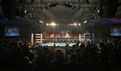 Lightweights Dean 'Pit Bull' White and Leo 'The Lion' Martinez faced off in the first match of the annual Fight Night, which raised $3 million for children's health and education in Washington.