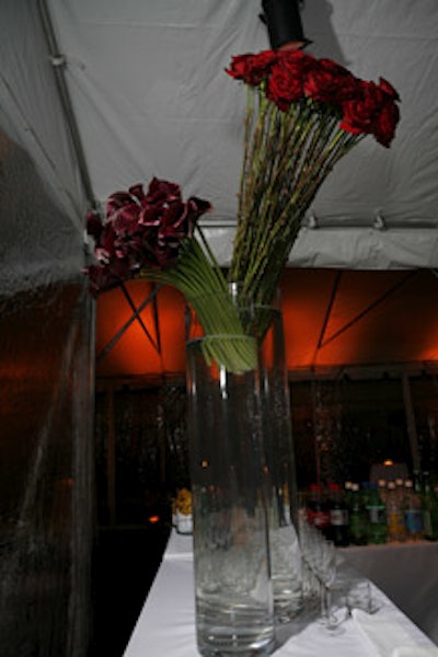 Arrangements of roses and calla lilies added a shot of color.