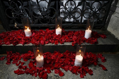 Rose petals and candles decorated the society's entrance.