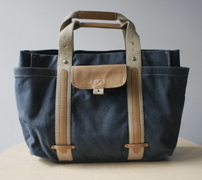 Hayden-Harnett's large canvas Erol tote bag ($155) has a roomy lined interior and plenty of pockets to keep track of small items.