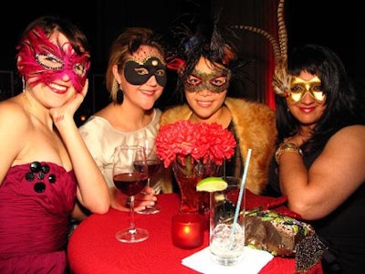 Partygoers wore colourful masks.