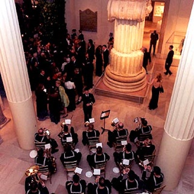 A military band announced that dinner would begin.