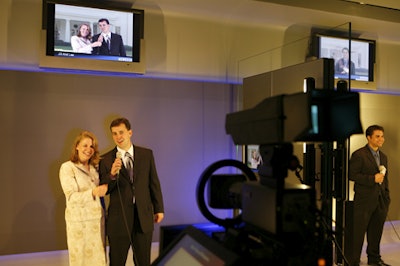 Guests had the chance to see what live reporting was all about with interactive exhibits that placed them in front of the White House and the Supreme Court (courtesy of a blue screen).