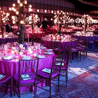 Philip Baloun's decor included pink and purple tablecloths and tall centerpieces with votive candles.