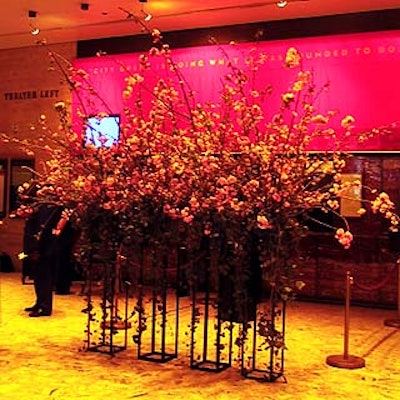 Philip Baloun placed large arrangements of cherry blossoms in the theater's lobby.
