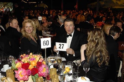 Guests including Alec Baldwin and Donna Dixon took in the live auction.