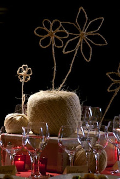 Instead of flowers, David Stark created flower-shaped centerpieces from brown twine.