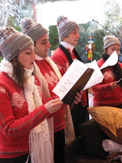 Carol singers in Bank of America-branded clothing entertained guests.