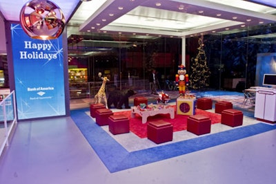In a carpeted section of the venue, children could play with toys and decorate wooden snowflakes, stars, and gingerbread men.