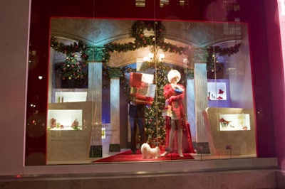 Spaeth Design created the displays in the windows—on par with other holiday windows at nearby department stores like Macy's and Lord & Taylor—using full-size mannequins, which can be activated using buttons at the bottom of each window.