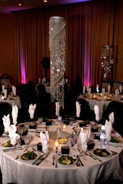 Inside the ballroom, tables were topped with centerpieces designed to create the illusion of a waterfall of diamonds.