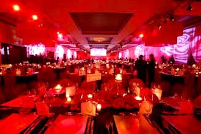 From the lighting to the centerpieces, auction items, and carpeted entrance, red was the color of the evening.