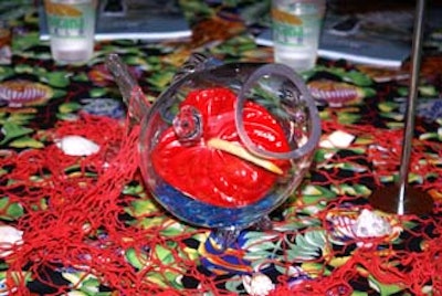 A whimsical glass fish topped off each table as a simple, yet festive centerpiece.