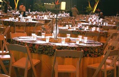 Guests dined at table clad in tropical patterns on the outfield at Tropicana Field.