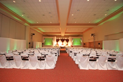 The white chair covers in the main presentation ballroom made the theater-style seating uniquely formal.