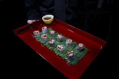 Taste Caterers' waiters passed rice paper rolls with wild mushrooms and ponzu sauce, one of six hors d'oeuvres offered during the cocktail hour.