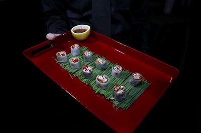 Taste Caterers' waiters passed rice paper rolls with wild mushrooms and ponzu sauce, one of six hors d'oeuvres offered during the cocktail hour.