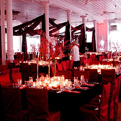 Antony Todd draped red fabric above the dance floor in front of the DJ booth.
