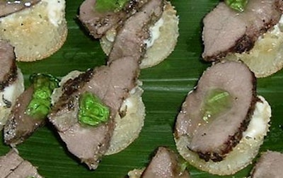 Spearmint pesto topped the sliced seared lamb loin on maple crumpets.