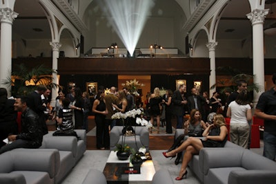 Guests among the crowd of close to 500 lounged on plush gray sofas.