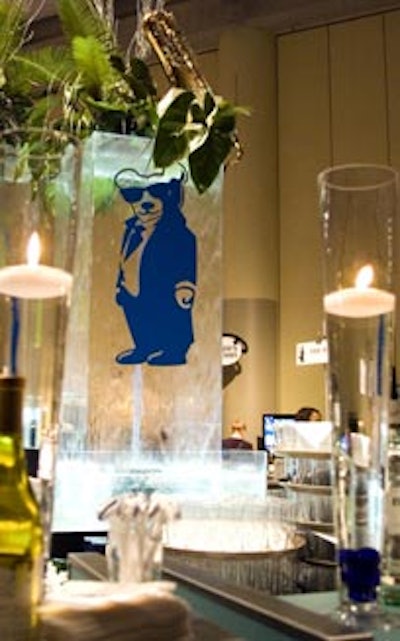 An image of the Teddy Bear Affair's Blues Brothers-inspired bear mascot jazzed up a decorative waterfall.