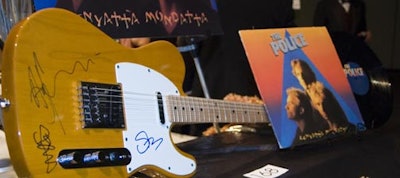 The silent auction featured music memorabilia such as this Fender Telecaster signed by all three members of the Police.