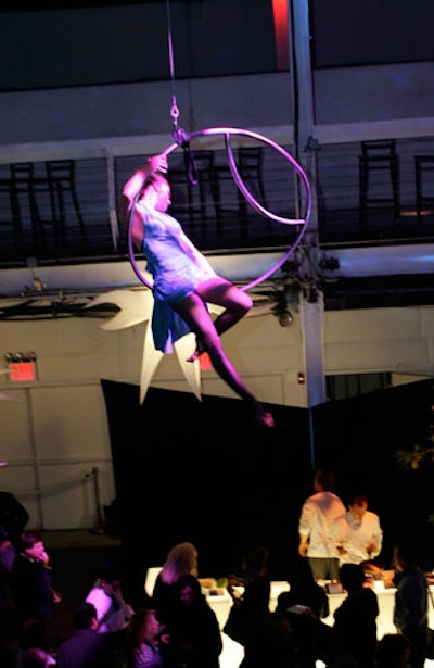 An aerial trapeze show by Acroback entertained the crowd.