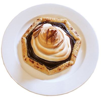 Los Angeles-based Global Cuisine offers a s'mores-like chocolate Bavarian cream tart. Pastry chef Todd Dickinson tops the pastry with marshmallow meringue and chocolate shavings.