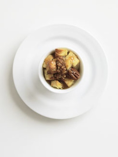 Toronto's Bite Catering serves its mini praline and caramel bread pudding in an espresso cup. Chefs Lara Katz and Karen Rachlin bake cubes of brioche in a sweet cream mixture, then top the puddings with caramel and crushed pecans.