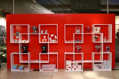 Illy displayed other products on-site with shelves in its signature red-and-white palette.
