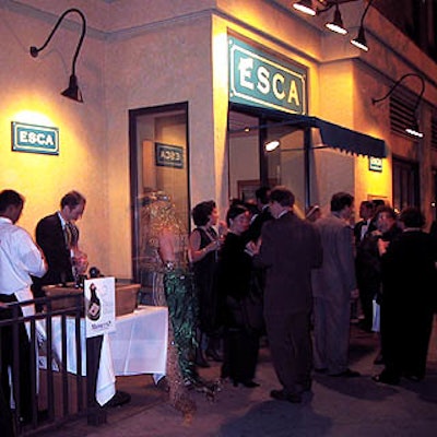 Guests who enjoyed the cool spring evening lingered in front of Esca before entering the party.