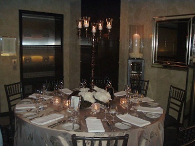 Chair-man Mills provided the table settings at Tiffany & Company.