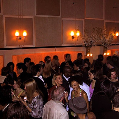 A large crowd of revelers danced in the Town restaurant space at the Chambers Hotel during Conde Nast Traveler's party to promote its 'Hot List' issue.