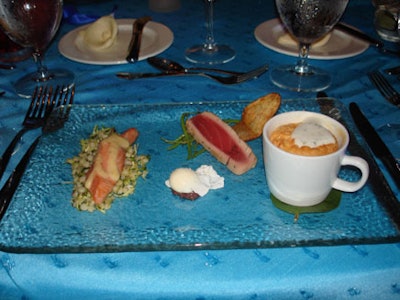 The appetizer trio consisted of citrus-smoked salmon on a bed of microgreens, yellow tomato emu with micro tuna nicoise, and lobster espresso with tarragon cream.