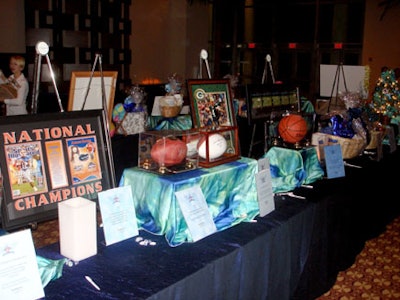 Sports memorabilia among the silent-auction items included autographed footballs, pictures, and basketballs.