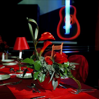 Centerpieces from Visser's Florist & Greenhouses kept with the pervasive red theme.