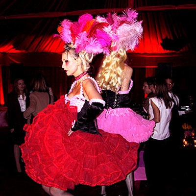Cancan girls from Screaming Queens danced inside a red tent for the Lancel store opening party.