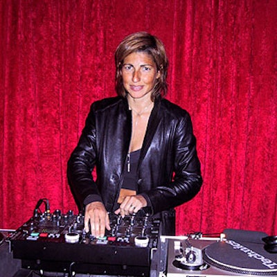 DJ Milly De Mori from SoundSelective played a fun mix of Edith Piaf, French pop, show tunes and current music that suited the events French cabaret theme.