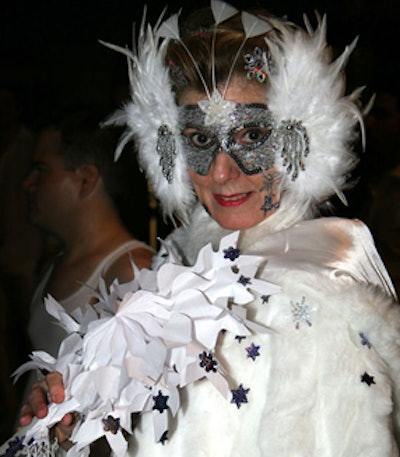Partygoers arrived in whimsical white costumes complete with feathers, masks, and lots of angel wings.