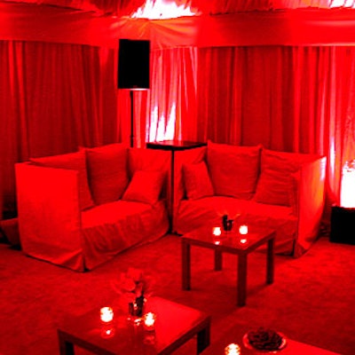 The furniture included red couches and coffee tables.