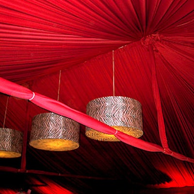 The entire tent--beams included--was covered in red fabric.