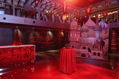 Red tinsel Christmas trees and cutouts of Moscow's famous architecture decorated the Red Square-themed room.