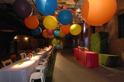 Colourful balloons hung from the ceiling above the 40-foot-long dining table.