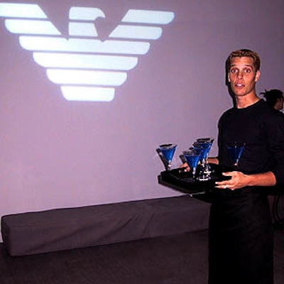 Guests entering the sixth floor of the store found waiters from Restaurant Associates serving blue drinks and gobo lights (by Lux Lighting) showing the Emporio Armani and Webby Awards logos.