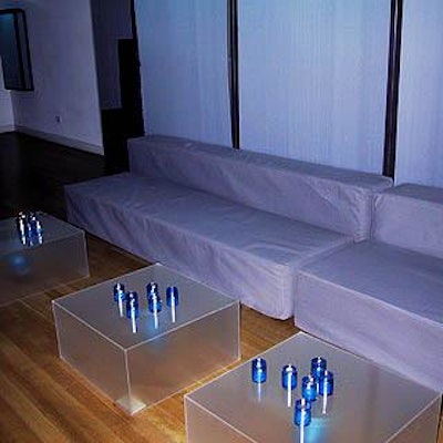 Sleek gray couches provided seating, and votives candles in blue glass holders were scattered around the space.