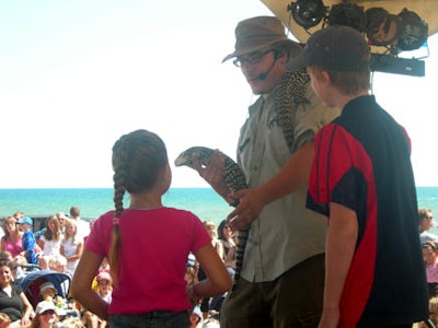Rob Ruthart lets guests interact with pythons, boas, geckos, and chameleons.