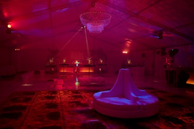 A white vinyl seating arrangement sat in the center of the dance floor.