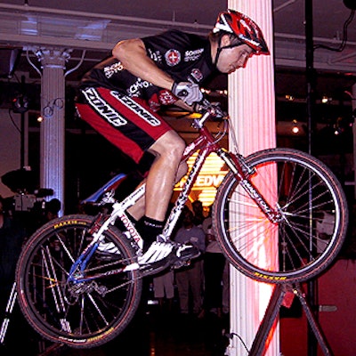 Professional mountain biker Jeff Lenosky performed stunts on makeshift risers for the Speedvision and Outdoor Life Network upfront party at the Metropolitan Pavilion.