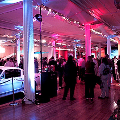 Metropolitan Pavilion hosted the event, which featured several cars, video games and a hang glider. The venue's walls were covered with chain-link fences.