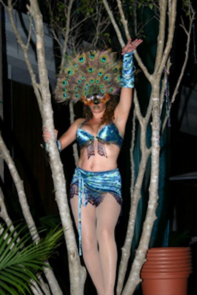 Costumed performers from Designs by Sean performed in the Setai's stationary in-pool trees.